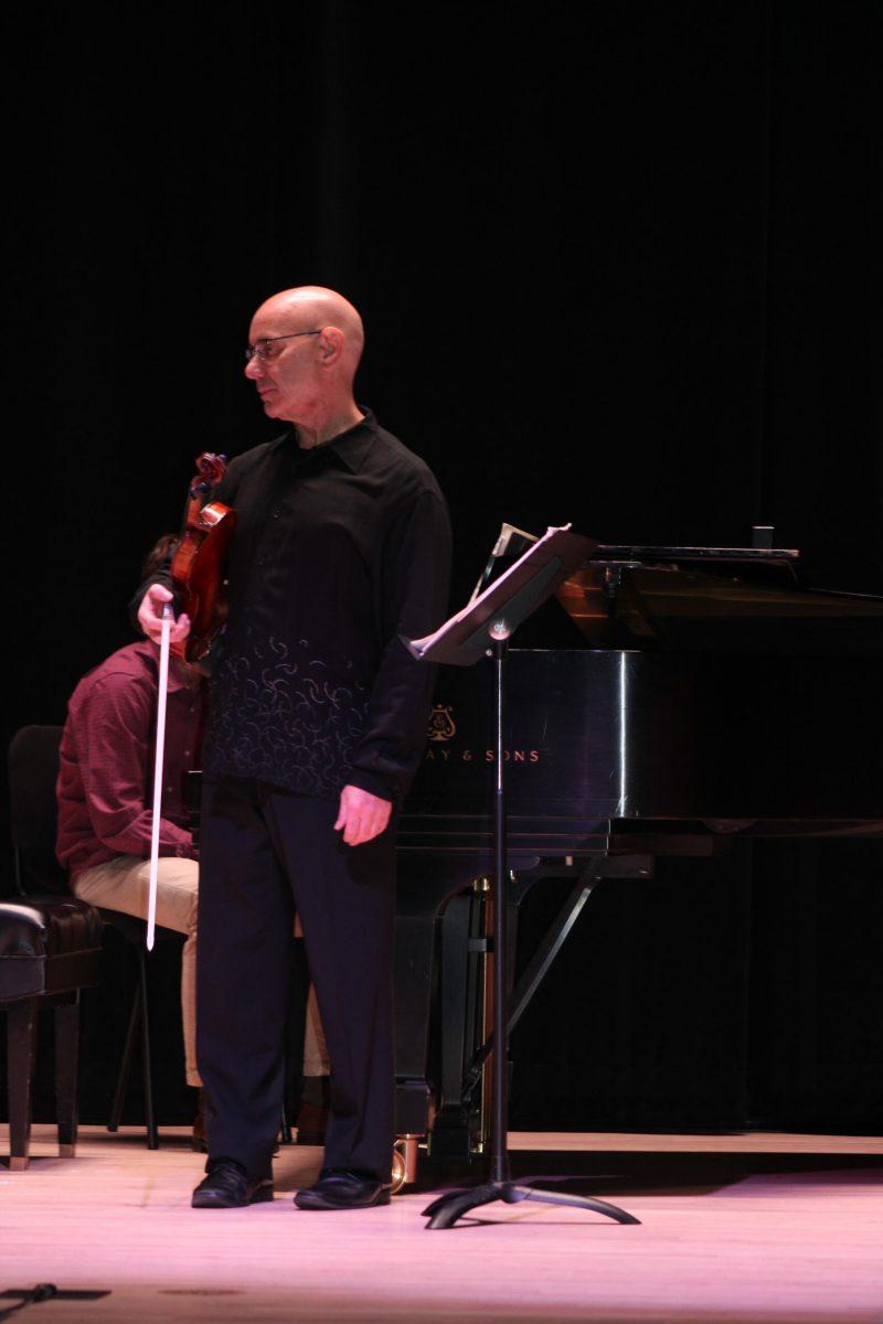 Hal Grossman performs violin in Boys Recital Hall. - Arts & Entertainment Editor / Tara Lonsdorf