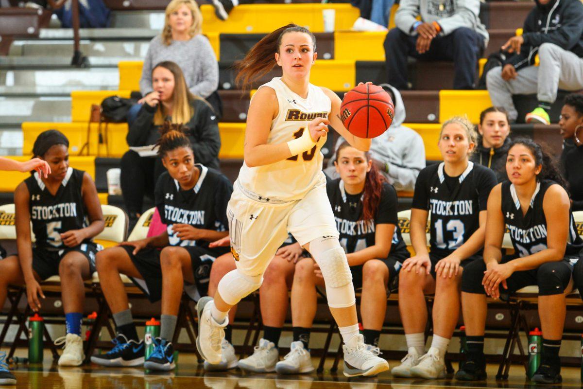 Senior guard Olivia Rulon brings the ball up the court against Stockton University last year. Photo courtesy of Rowan Athletics. 