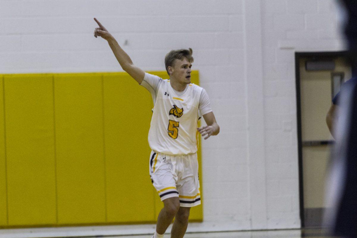 Sophomore guard Ryan Legler heads up the court in a game earlier this season. Legler is averaging 5.3 PPG this season. Multimedia Editor/Miguel Martinez