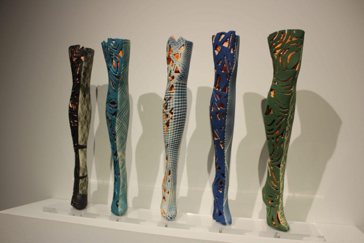 "Leg Parade" by Mari Ogihara explores the perceptions and realities of femininity within the gallery, "Enamored Armor." - Arts & Entertainment Editor / Tara Lonsdorf