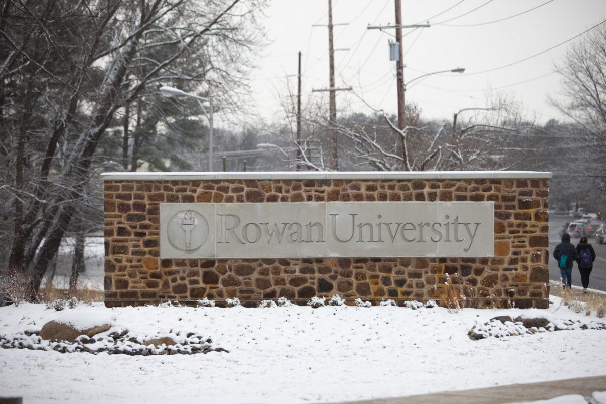 The Rowan University sign covered in snow. -Multimedia Editor/Miguel Martinez