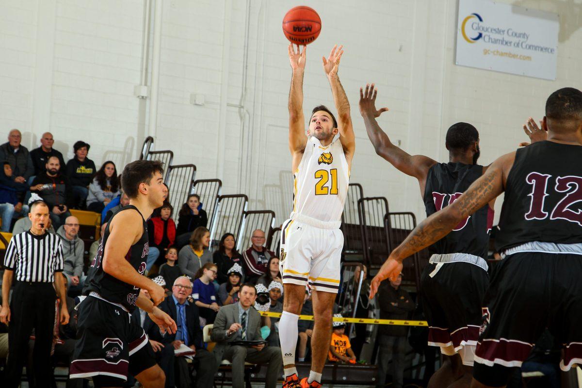 Nick DePersia pulls up for a jumper against Ramapo College. The Profs lost their first game of 2019 on Saturday against the Roadrunners. Photo courtesy of Rowan Athletics.