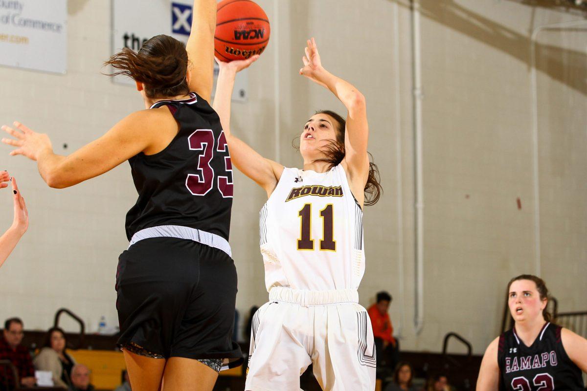 Rowan's Alexis Kriley goes up for a contested shot earlier this year against Ramapo College. Photo courtesy of Rowan Athletics