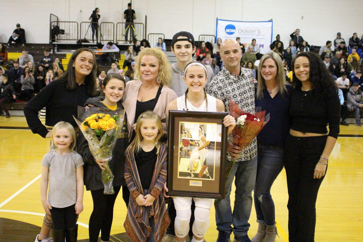 Senior guard Olivia Rulon celebrates on Senior Night this past Saturday. Photo courtesy of Rowan Athletics. 