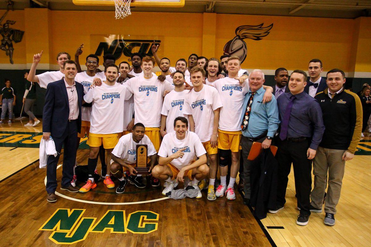 The Rowan men's basketball team celebrate their New Jersey Athletic Conference (NJAC) title for the first time since 1999. Photo courtesy of Rowan Athletics. 