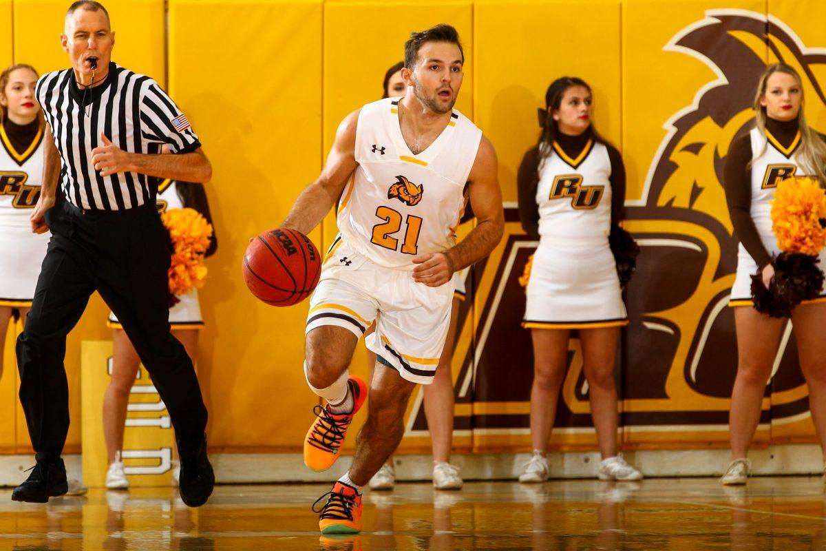 Senior guard Nick DePersia looks down the court. Photo courtesy of Rowan Athletics