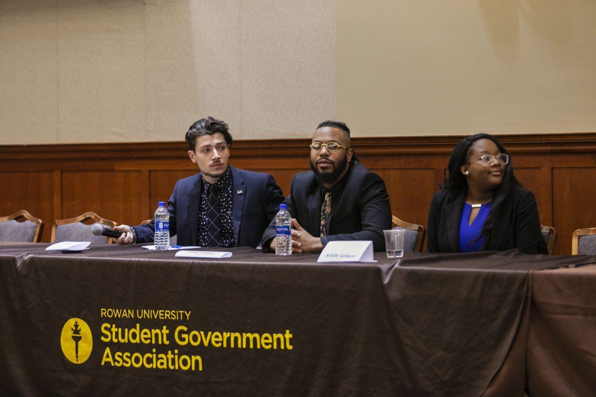 SGA Presidential candidates (from left to right) Michael J. Webster, Chad Hinson,  and Arielle Gedeon, speak at Rowan SGA meeting on Monday in the Student Center Ballroom. Multimedia Editor / Miguel Martinez.