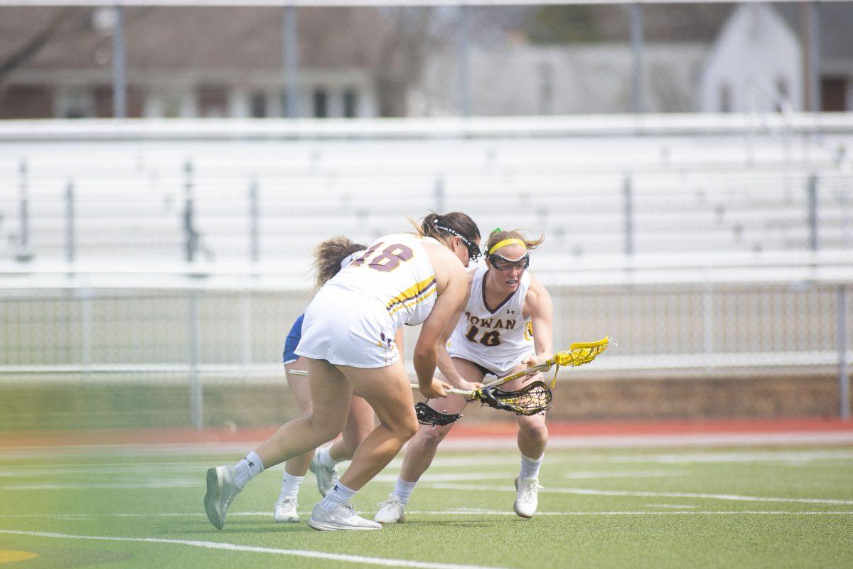 Seniors Haley Symons and Taylor Gretz go for possession in a game earlier this year. Multimedia Editor/Miguel Martinez.