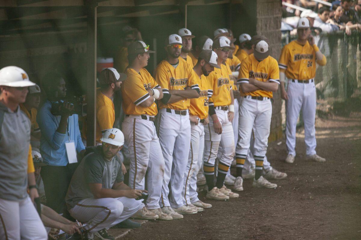 The Rowan baseball team in the dugout during a game. - File Photo / Miguel Martinez