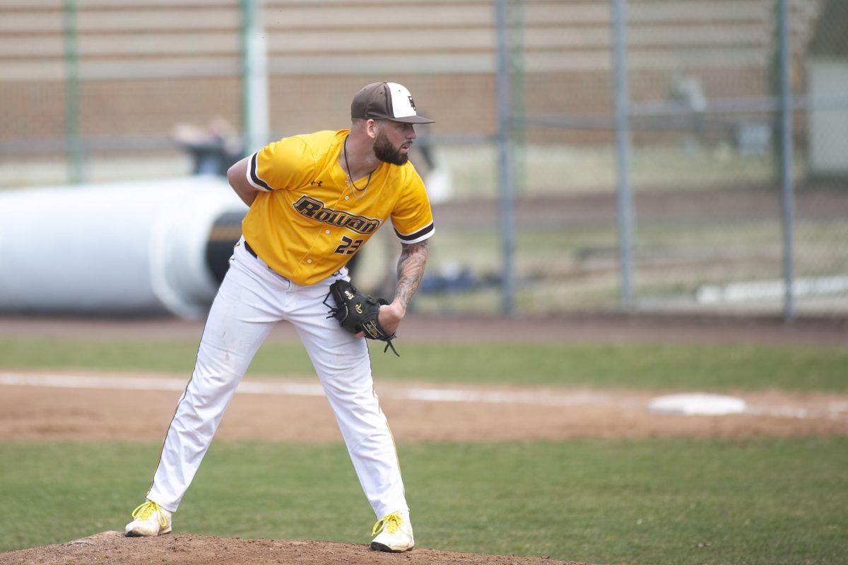 Senior Danny Serreino looks in for a sign in a game earlier this season. Multimedia Editor/ Miguel Martinez