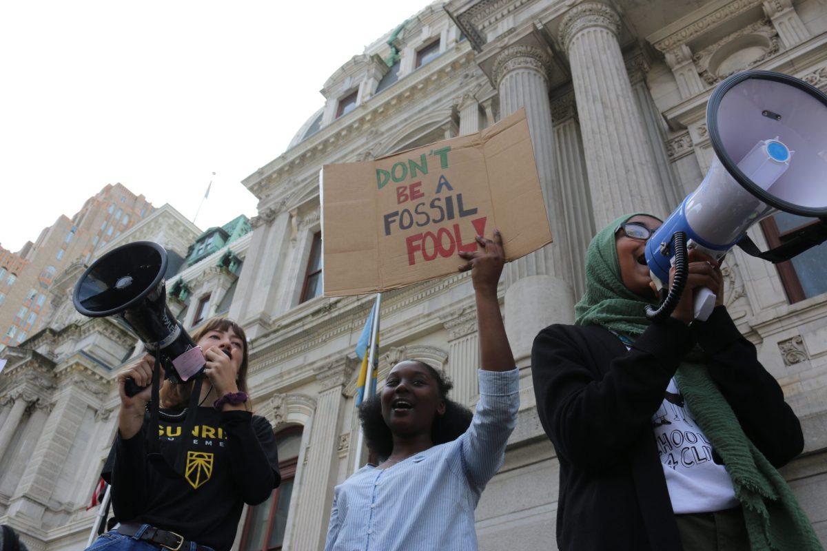 Sabirah Mahmud, Maggie Capp, and Reil Abashera speak to thousands of protesters at Philadelphia City during the Climate Strike - News Editor / Alexander Heller