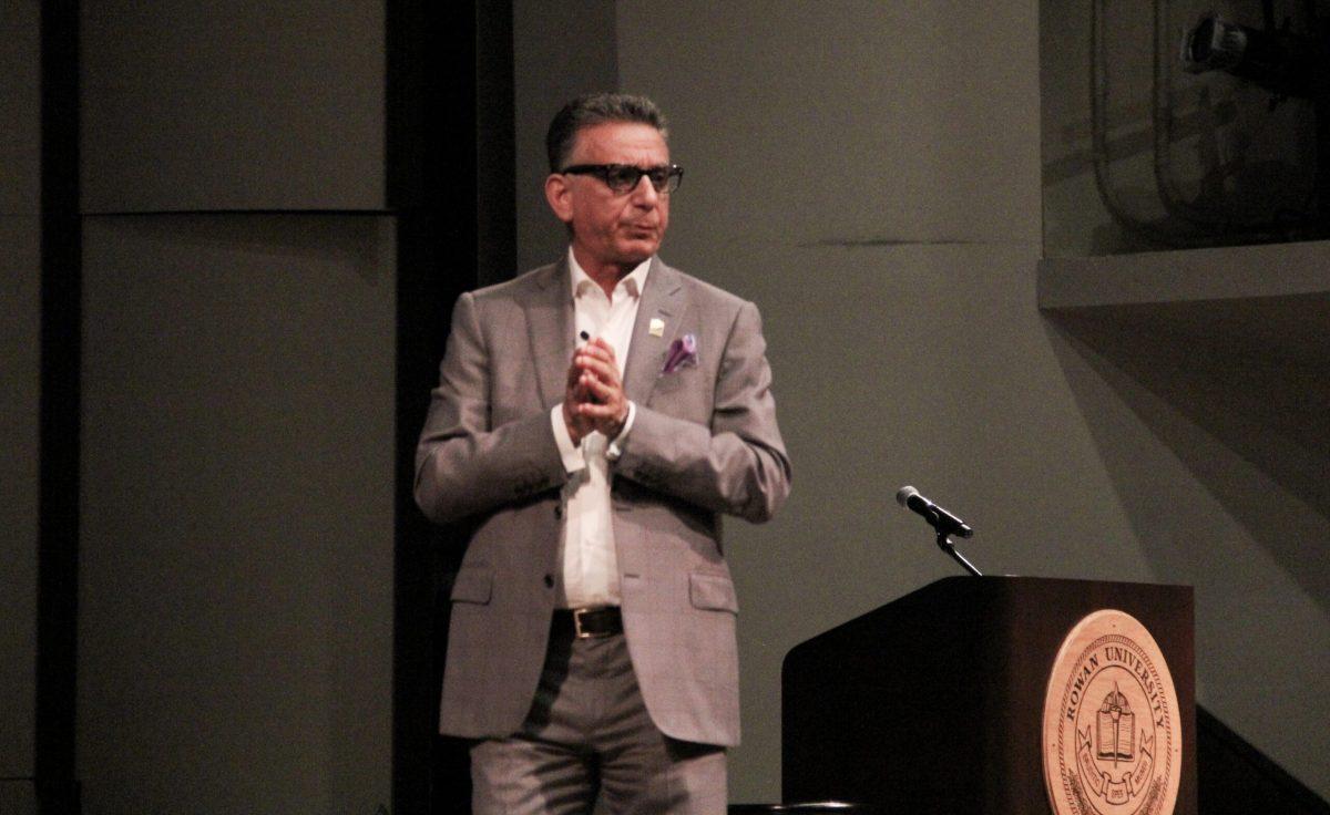 Rowan University President Ali Houshmand speaks to the crowd during University Assembled  - Staff Photographer / Harlan Drakes