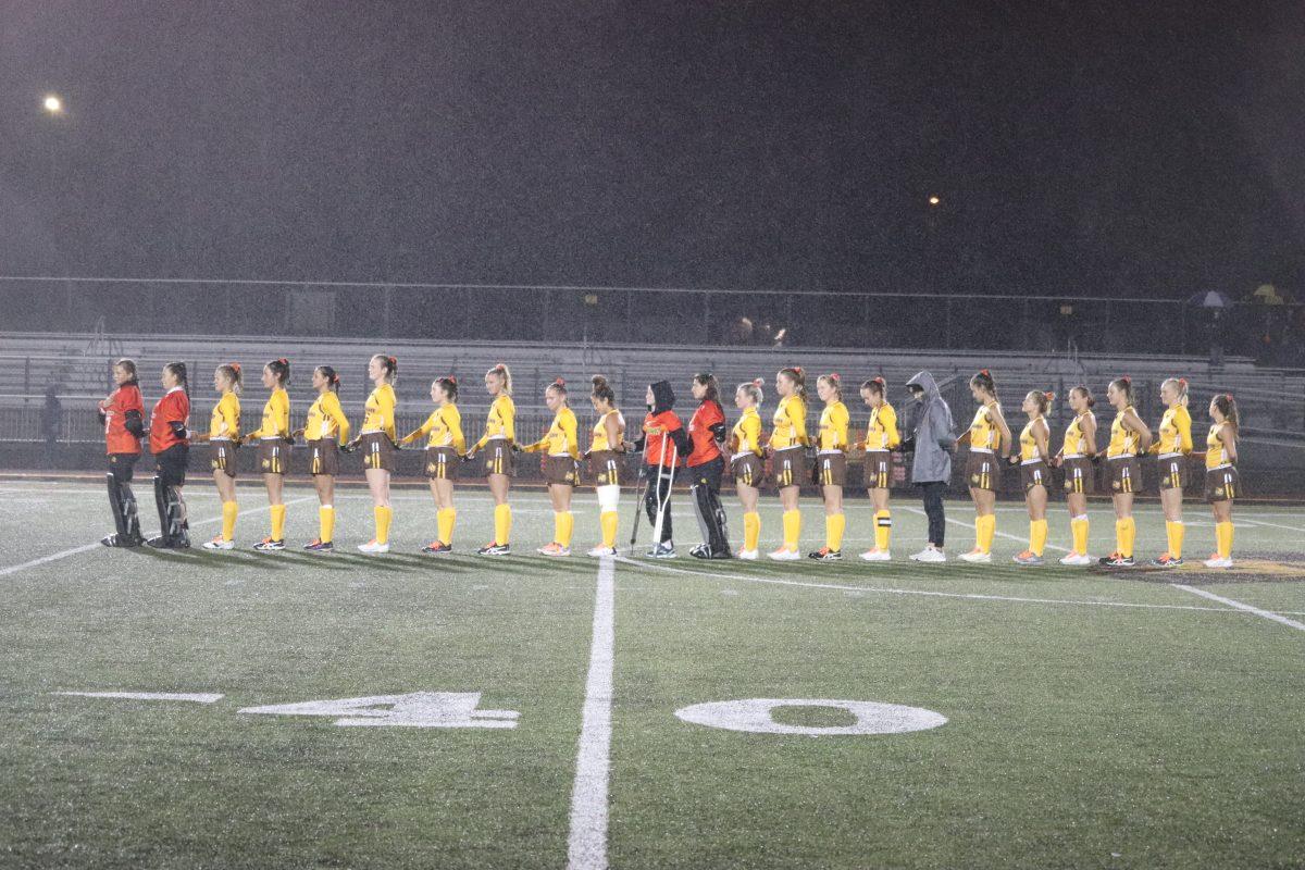 The field hockey team lines up before a game this year. Photo / Multimedia Editor Dyone Payne.