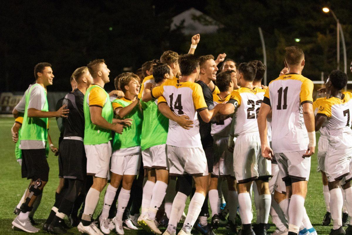 The men's soccer team celebrates in a game this year. Photo / Dylan Hickerson Rowan Athletics