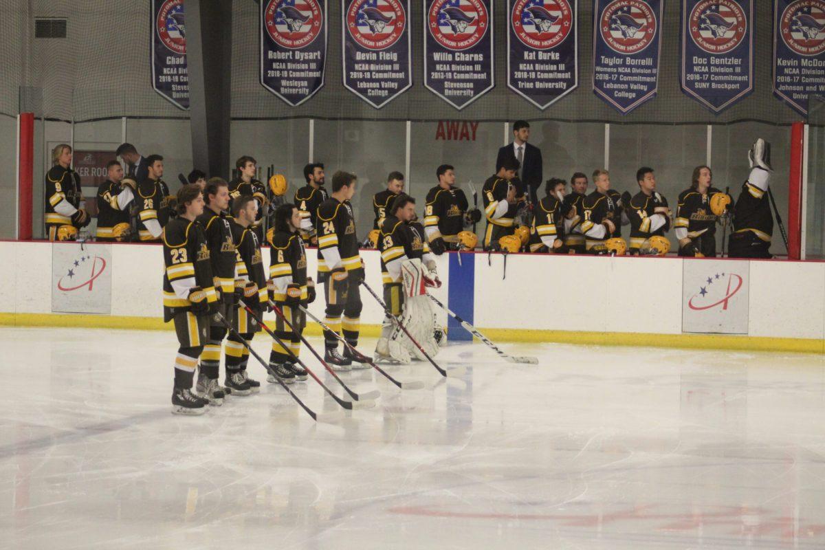 The D3 ice hockey team lines up pregame. Photo/ Emily Cavallero.