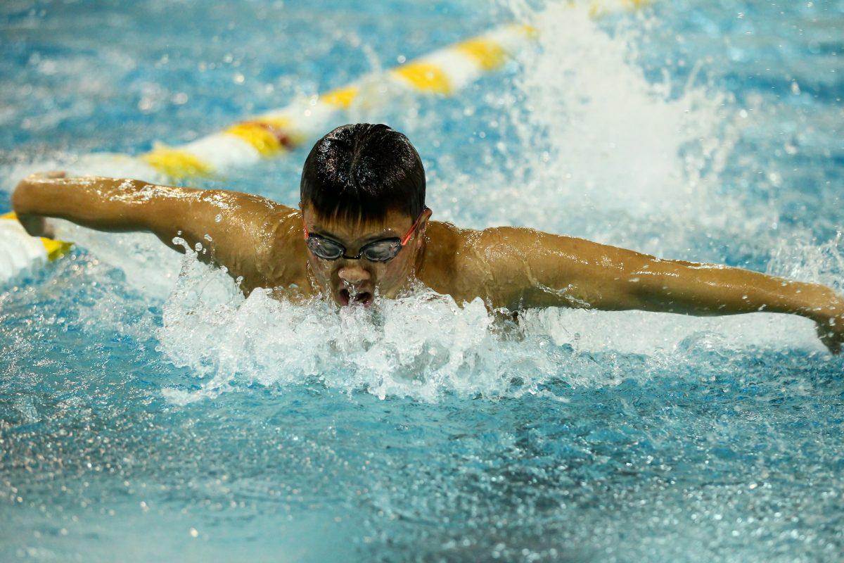 Kevin Yanagisawa swimming butterfly. - Photo courtesy of Rowan Athletics.