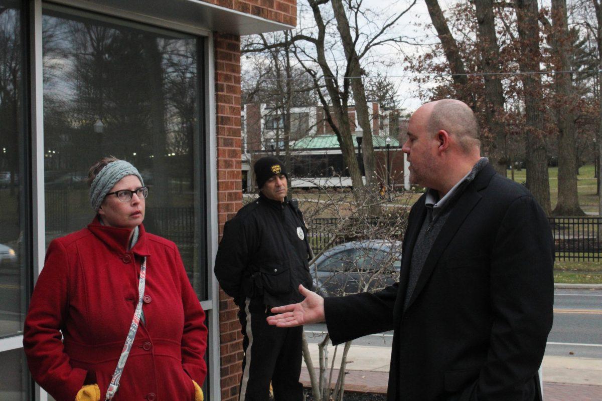 Rowan professor Carol Schottenfeld speaks with Wellness Center Director of Student Health Services Scott Woodside outside of the Wellness Center on Dec. 5, 2019. Schottenfeld was part of a group which had decided to congregate outside of the Wellness Center following a student's fall from the RoBo parking garage that same day. - Multimedia Editor / Christian Browne 