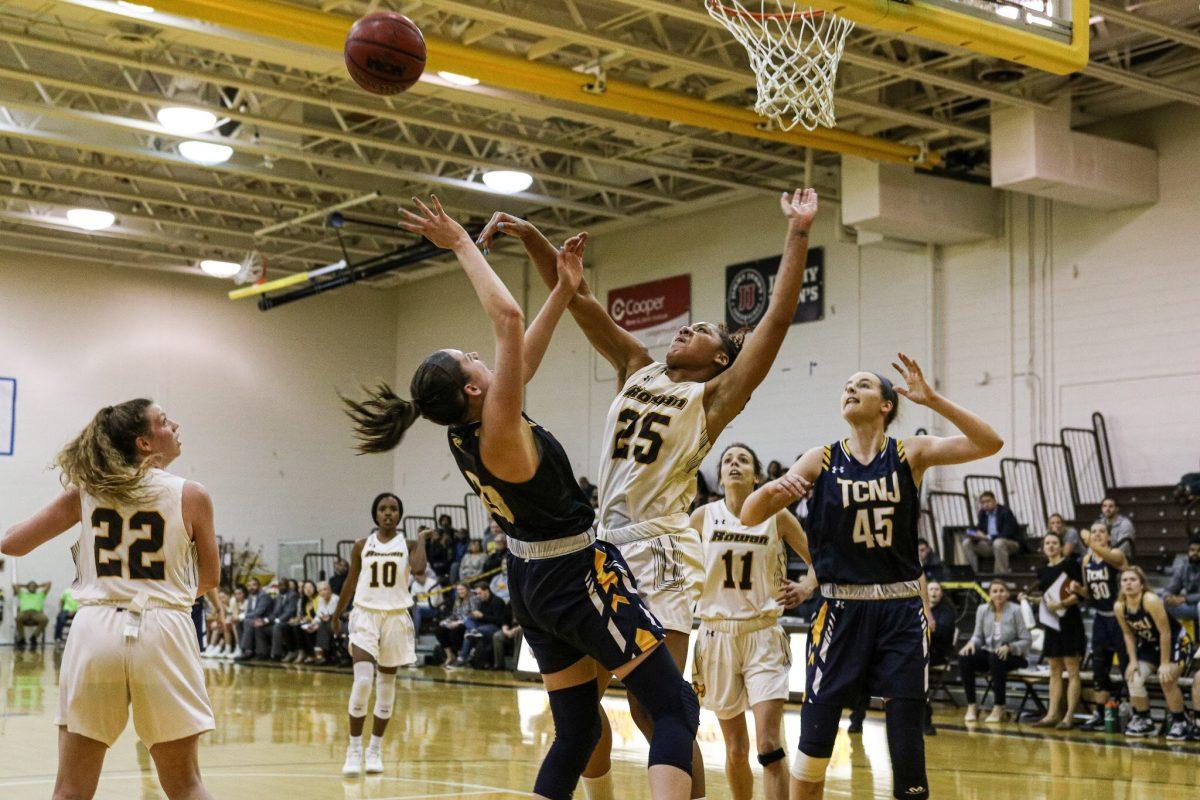 Ayanna Johnson blocks a shot against TCNJ in the NJAC Tournament  semifinals. Johnson was named 2020 NJAC Defensive Player of the Year. Tuesday, Feb. 25, 2020. Staff Photographer / Vincent Rebbecchi  