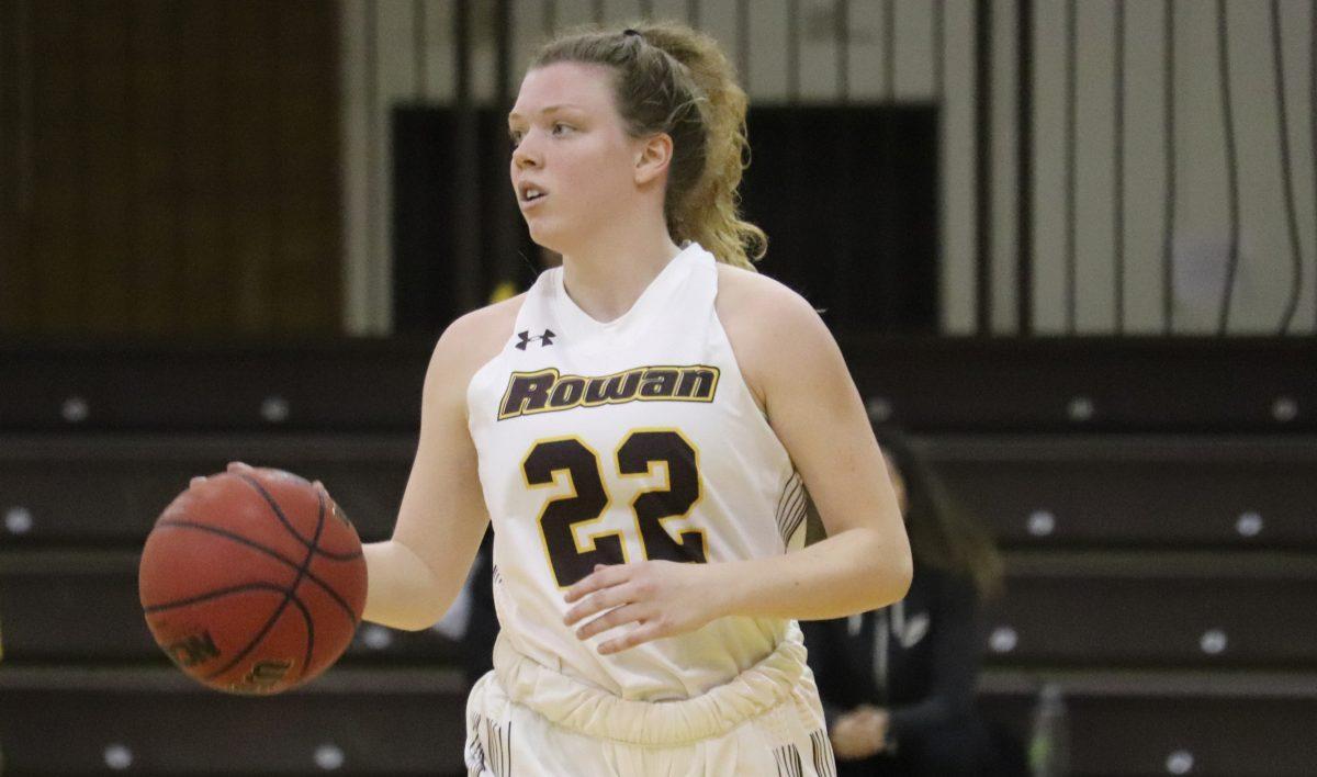 Grace Marshall brings the ball up in a game against TCNJ. Jan. 29, 2020. Dyone Payne / Multimedia Editor.