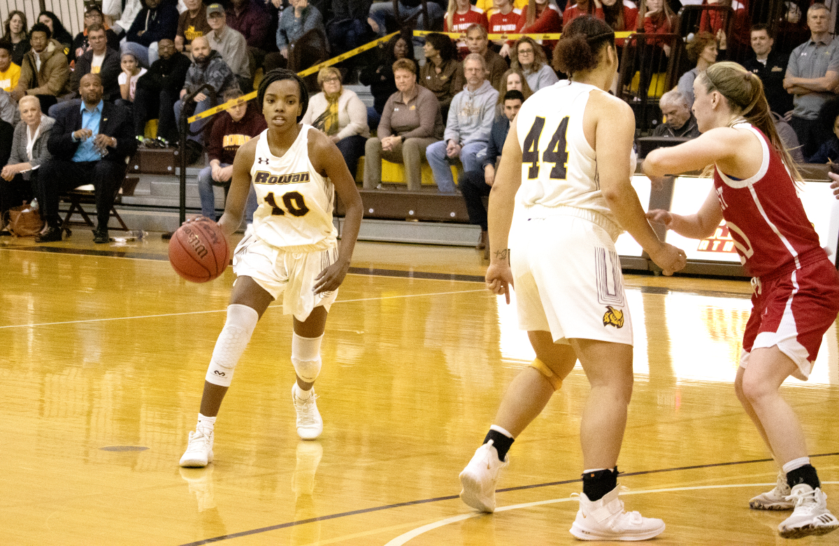 Kennedy Brown (left) dribbles the ball in a game against Montclair State. She finished with 11 points and four rebounds. Saturday, Feb 8, 2020. Multimedia Editor / Mike Reina.