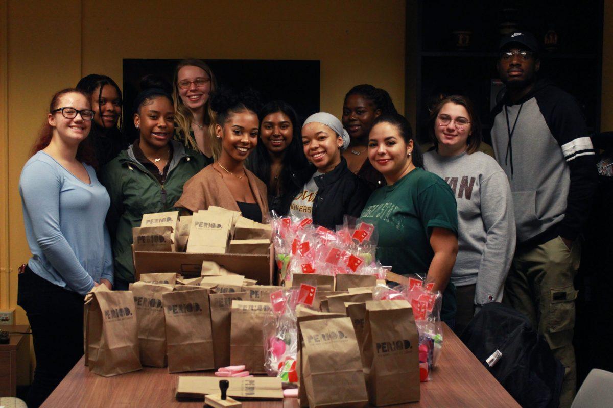 The Period Movement held a packaging party Monday night. The donations will go to the Glassboro Food Bank. - Assistant A&E Editor / Kristin Guglietti