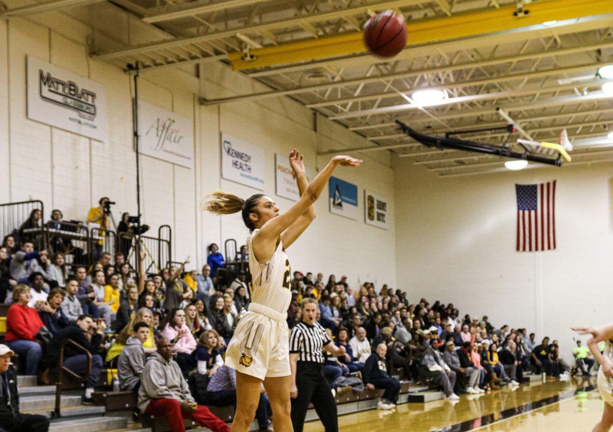 Savanna Holt shoots a three against TCNJ. Holt was 4-5 from three for her 12 points in the Profs 82-62 win. Tuesday, Feb. 25, 2020. Staff Photographer / Vincent Rebbecchi.