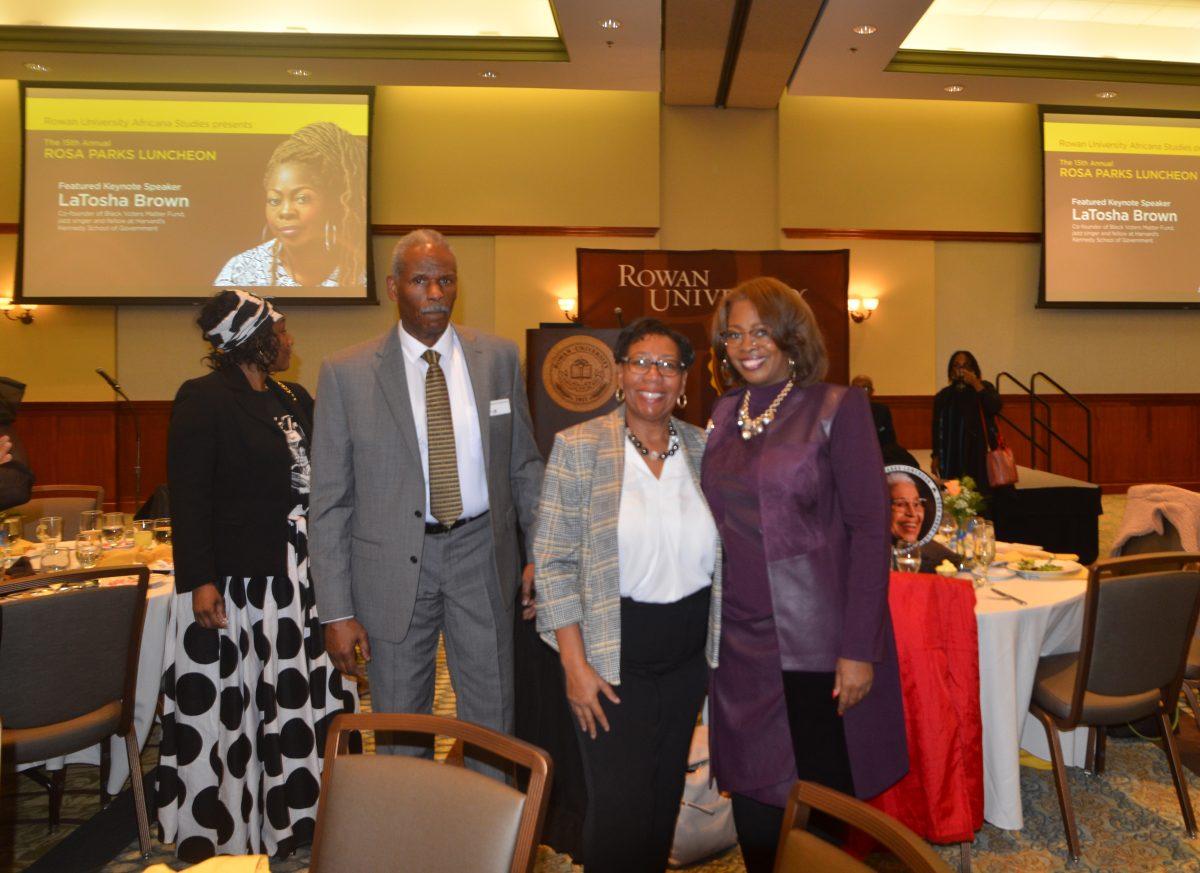 LaTosha Brown (right) takes a picture with organizer of the Rosa Parks luncheon Denise Williams (left). Staff Writer / Corey Rothauser 