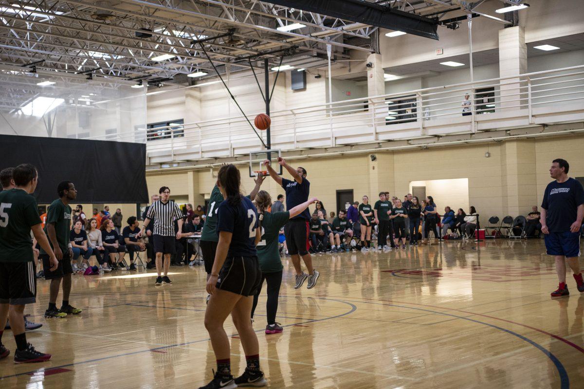 A player puts up a shot during the Rowan Unified Sports basketball tournament in the  Esbjornson Gym at Rowan University. Saturday, March 7, 2020. - Staff Photographer / Benjamin Stephens.