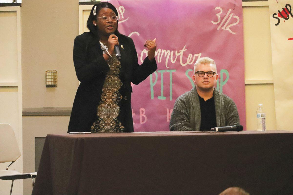 Arielle Gedeon, left, speaks during "meet the candidate" at the student center pit. Multimedia Editor / Mike Reina 