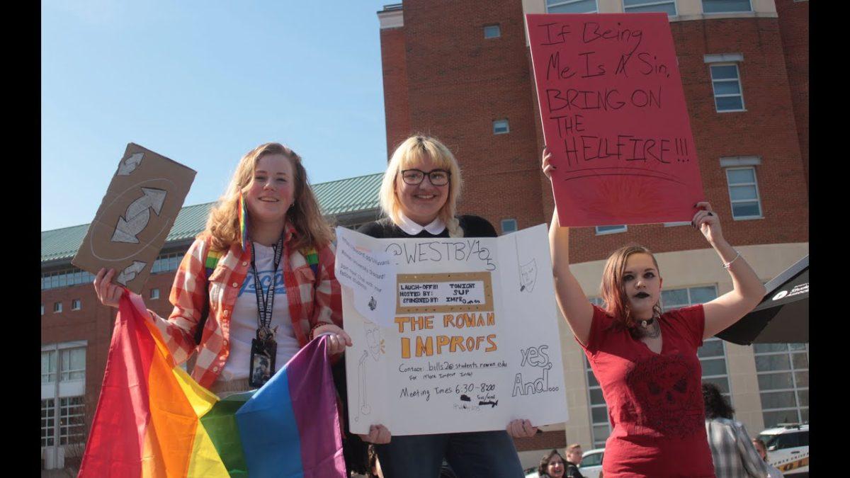 Students hold up signs in protest of the Key of David Christian Center - Assistant A&E Editor / Kristin Guglietti