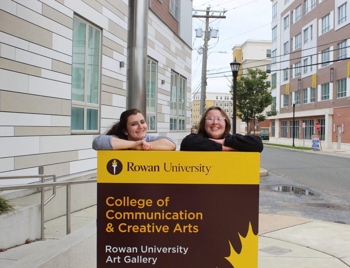 Women students from the Edelman College of Communication and Creative Arts smile in front of the communications building. - Multimedia Editor/ Alexander Rossen 