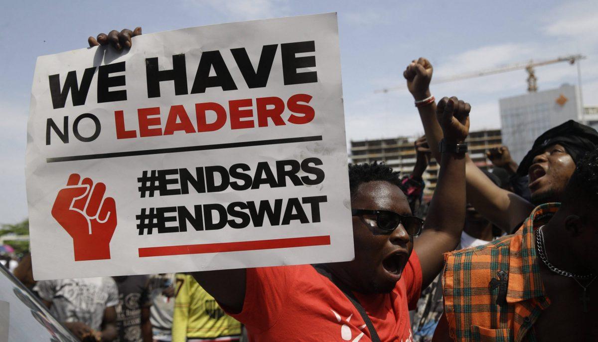 Citizens of Nigeria march to end the corrupt police group, SARS. This protester is fed up with the leadership in the country. - Photo via theafricanreport.com