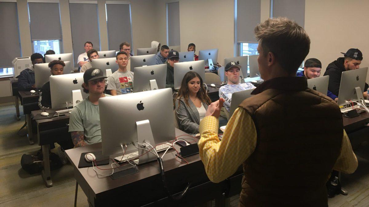 Dr. Emil Steiner teaching. Dr. Steiner, along with Kate Harman and Dr. Yannick Kluch were the ones who decided to change the name of the course. - Photo  Courtesy of Ric Edelman College of Communications and Creative Arts 