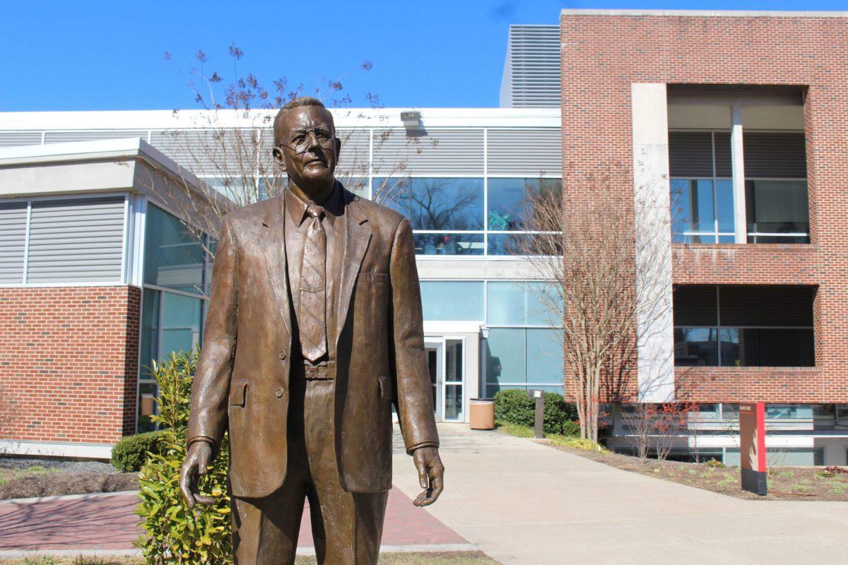 The statue of Henry Rowan stands outside Savitz Hall, an administrative building on campus where the Office of Financial Aid is located. - File Photo / Amanda Palma