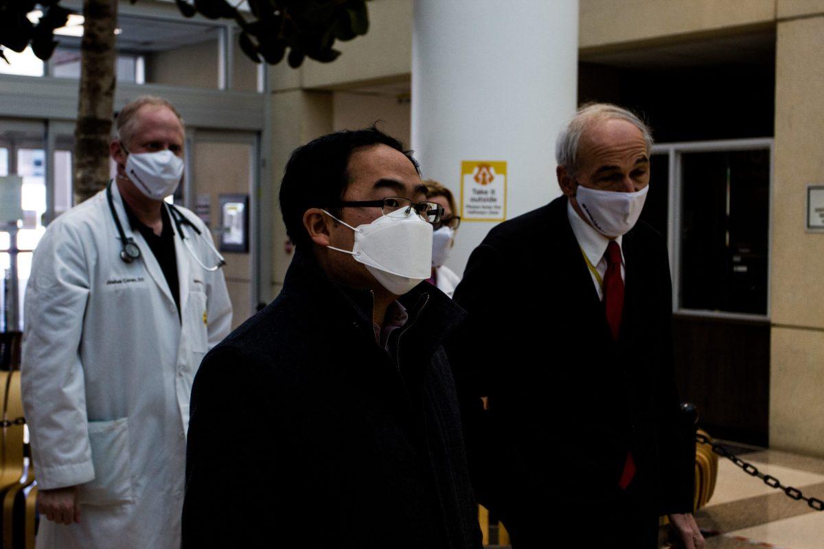 Dean Cavalieri takes Congressman Andy Kim on a walk-through tour of Rowan's vaccination center. Photo via Multimedia Editor / Alex Rossen