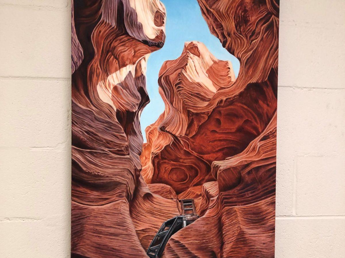 A painting of a canyon, created by Jessica Heritage for Intermediate Painting, hung in the hallway of Westby Hall. The Whit staff proposes that academic feats like this should be recognized across the university's many departments. - Editor-in-Chief / Kalie VanDewater