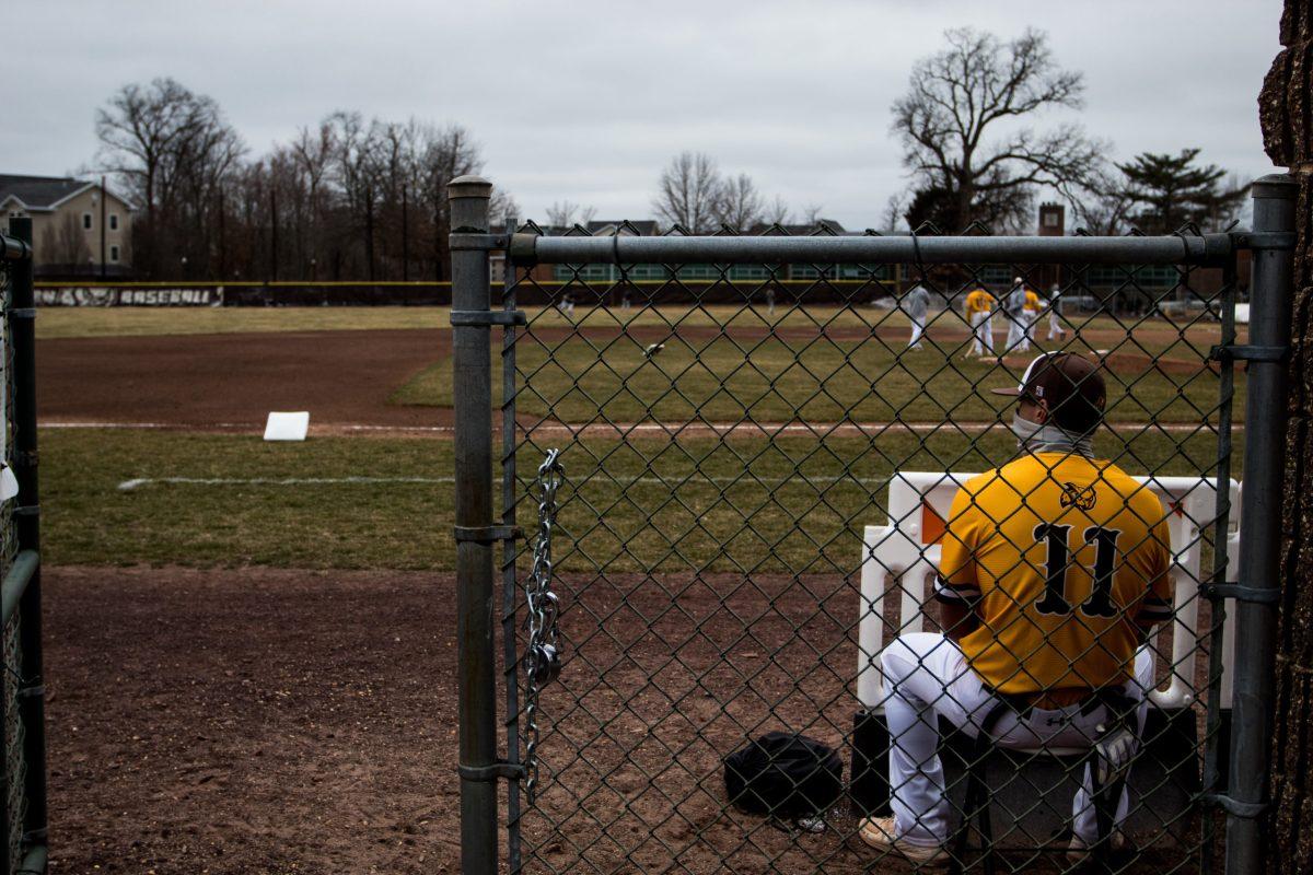 Senior Michael Manganella on the bench in between innings at the Cabrini game. The Profs won this game, which was their first game of the season, 6-1. - Multimedia Editor / Alex Rossen 