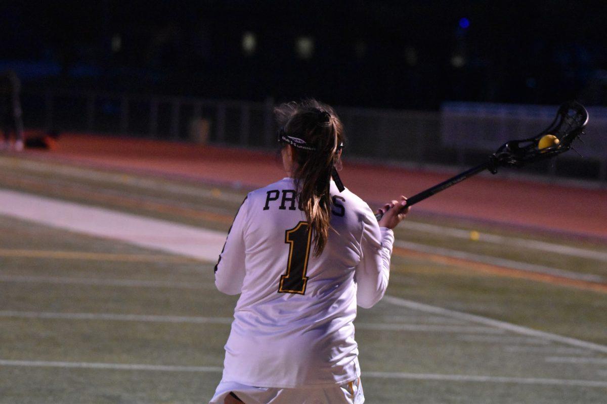 Rowan lacrosse's Ashley Lechliter stands during their game versus Stockton University on March 30. Lechliter currently leads the team in points scored. - Staff Photographer / Nicholas Feldman