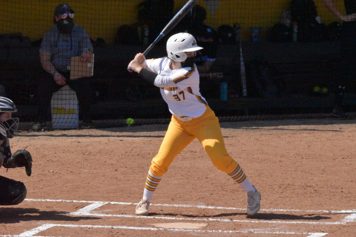 Rowan softball's freshman infielder Payton MacNair up to bat against Stockton University on March 27. In the most recent doubleheader matchup against Stockton, MacNair recorded three hits and a RBI over two games. - Staff Photographer / Nicholas Feldman