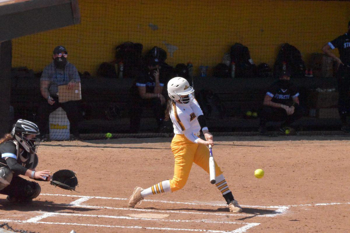 Rowan softball's Mariah Wysocki swings at a pitch during their game against Stockton on March 27. In Rowan's second win against NJCU this past Saturday, Wysocki recorded 6 RBIs and a three-run homer. - Staff Photographer / Nicholas Feldman 