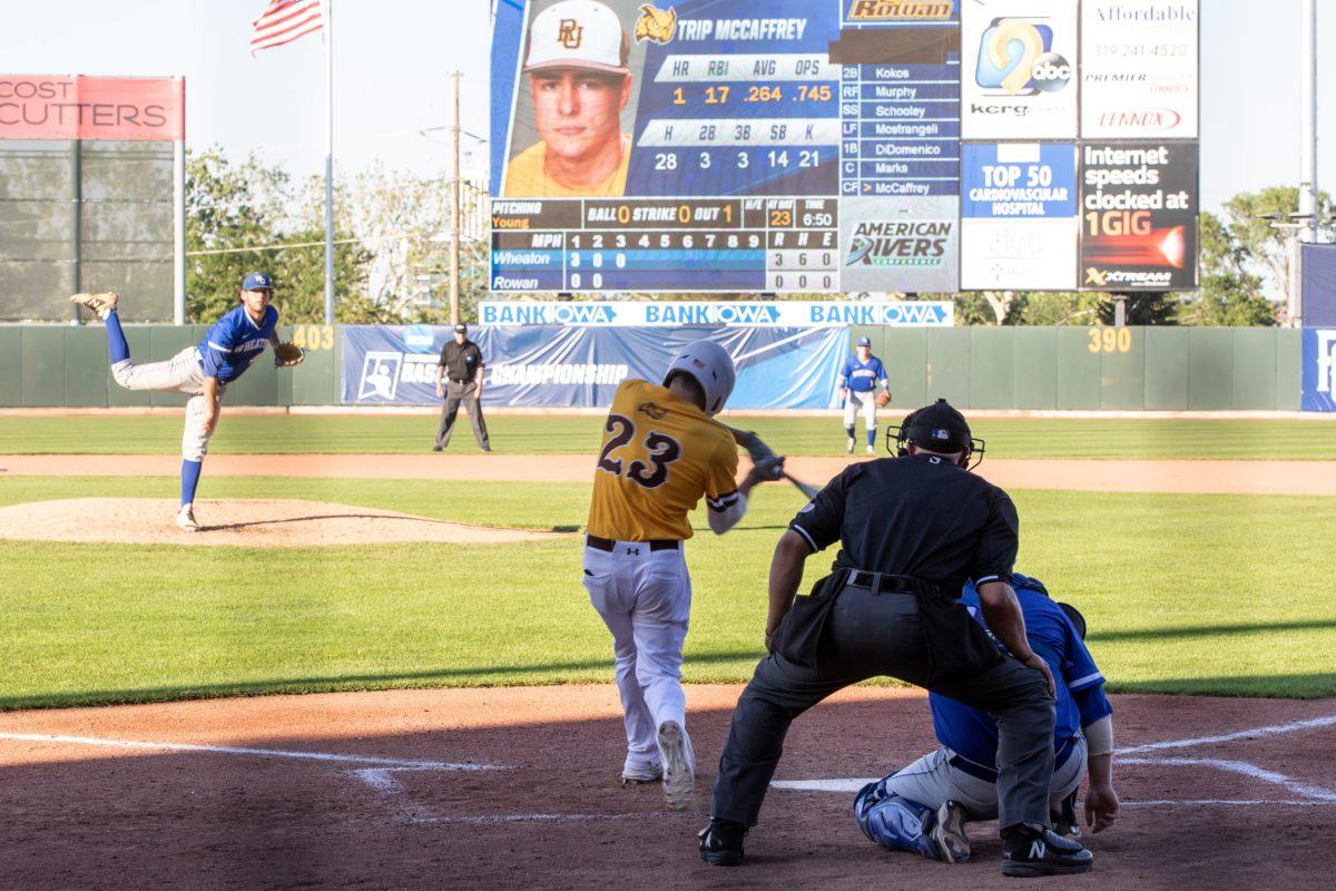 Rowan center fielder Trip McCaffrey swinging at a pitch from Wheaton pitcher Griffin Young during the NCAA Division lll World Series. Wheaton defeated Rowan 6-0 in the first round matchup. Friday, June 4, 2021. - Photo Credit / Joe Adams 