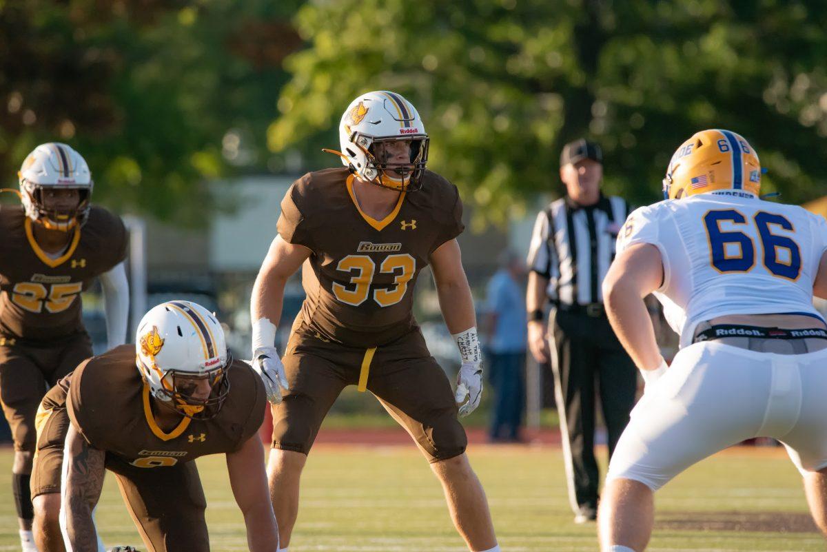 Rowan's Tim Hutchison lining up before snap. Hutchison had three sacks in their loss against Salve Regina last weekend. Saturday, Sept. 11, 2021. - Multimedia Editor / Nick Feldman
