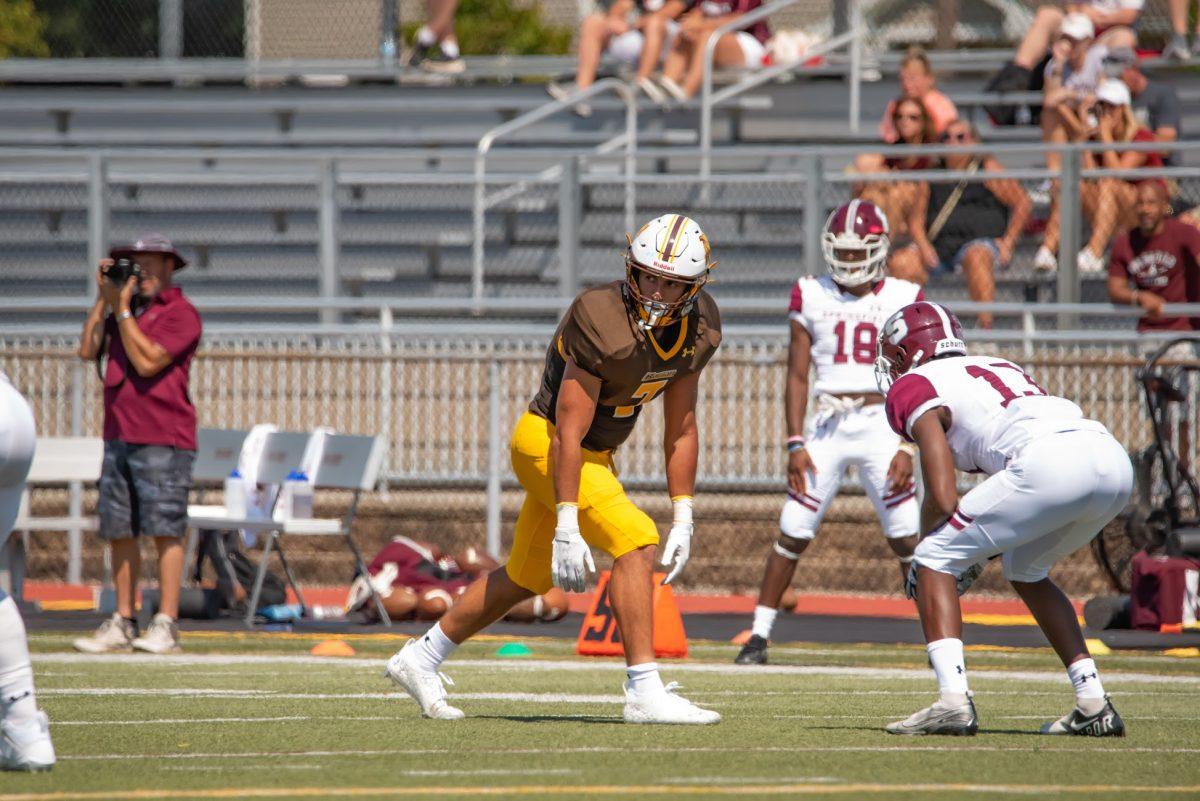 John Maldonado lining up before the snap against Springfield this past Saturday. Maldonado is one of the captains this season. Saturday, Sept. 11, 2021. - Multimedia Editor / Nick Feldman