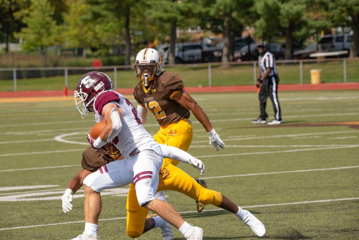 Rowan's Calvin Harper attempting to tackle Springfield's Ryan Deguire in their game this past weekend. Rowan's defense gave up 495 rushing yards to Springfield. Saturday, Sept. 11, 2021. - Multimedia Editor / Nick Feldman