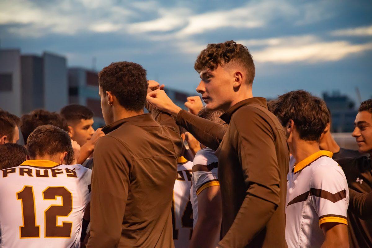 Rowan men' soccer team in their huddle before their game against Rutgers-Newark. They would lose that game 2-1. Saturday, Sept. 25, 2021. - Multimedia Editor / Nick Feldman