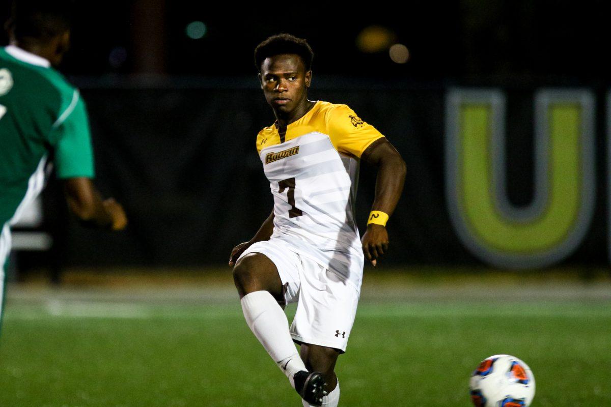 Rowan's Wilby Alfred kicking the ball during a game. Alfred totaled four goals this past weekend in during Rowan's two wins. - Photo / Rowan Athletics