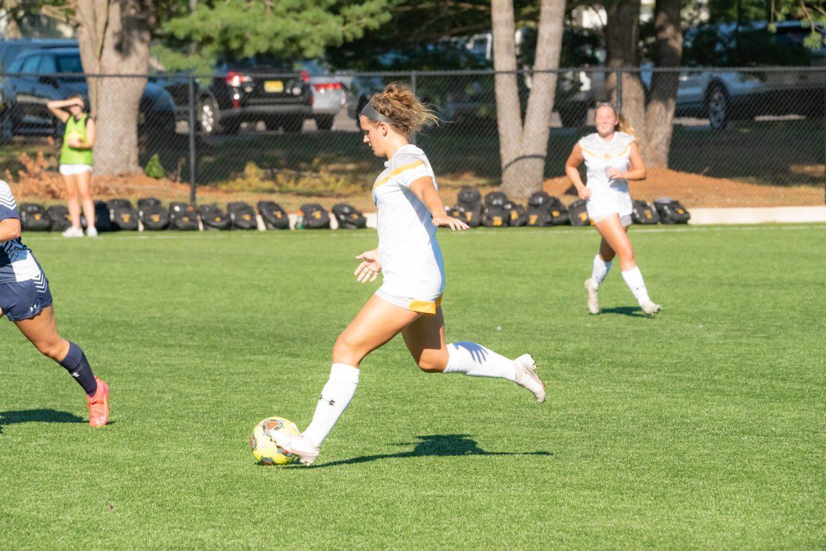 Rowan's Emma DeMaise going to kick the ball during a game earlier this season. DeMaise would score one goal in the victory against Rutgers-Newark this past weekend. Saturday, Sept. 4, 2021. - Multimedia Editor / Nick Feldman