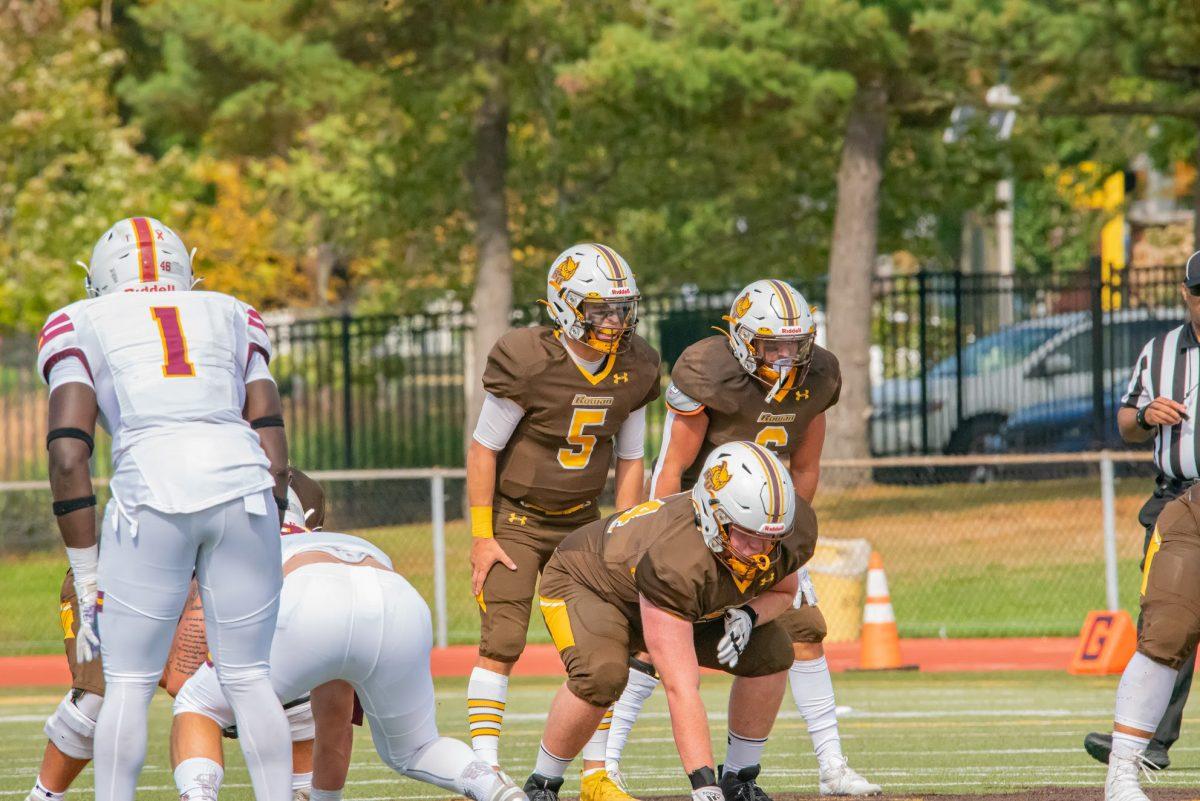 Rowan's quarterback Mike Husni lining up for the snap. Husni would have three interceptions in Rowan's loss to Salisbury this weekend. Saturday, Oct. 16, 2021. - Multimedia Editor / Nick Feldman