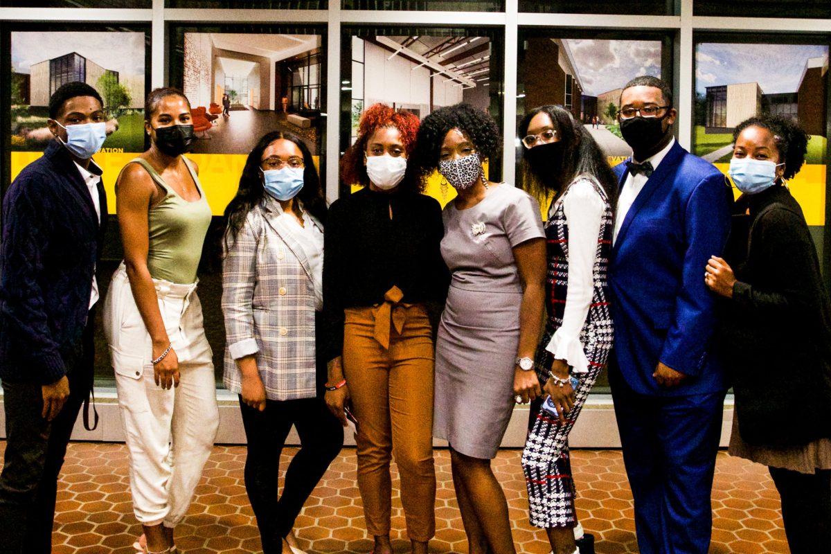 The BSU student E-Board poses with faculty leaders. From left to right: Mike Nash (Event Coordinator), Jasmin Jones (Historian), Niomie Nurse (Founding Treasurer), Leilanie Hinton (President), Dr. Kha' Sadler (BSU Advisor), Hydia Bearfield (Founding Secretary), Jamar Green (Vice President), Dr. Chanelle Rose (Department Coordinator, Africana Studies) - Multimedia Editor / Alex Rossen