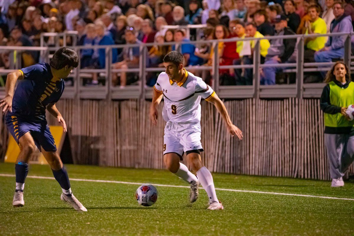 Rowan's Anthony Arena trying to go around a defender in a game earlier this season. In the game against NJCU, Arena would score his first goal of the season. Wednesday, September 29, 2021. - Multimedia Editor / Nick Feldman